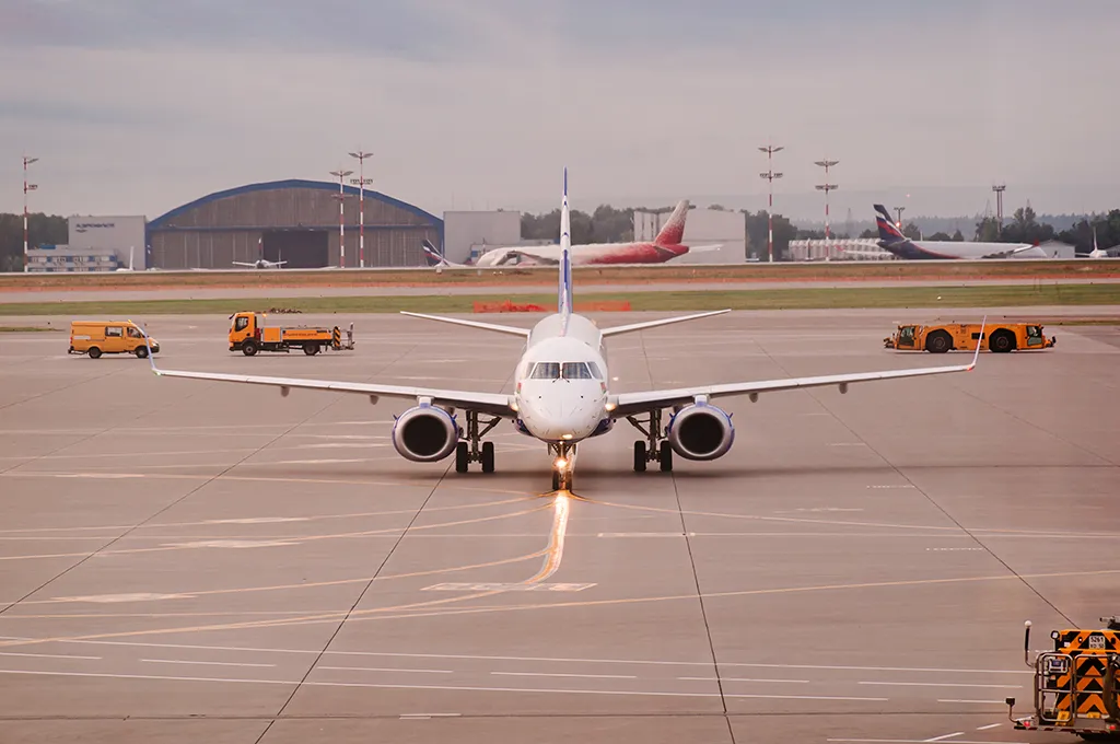 Charter aircraft undergoing pre‑flight ground handling.